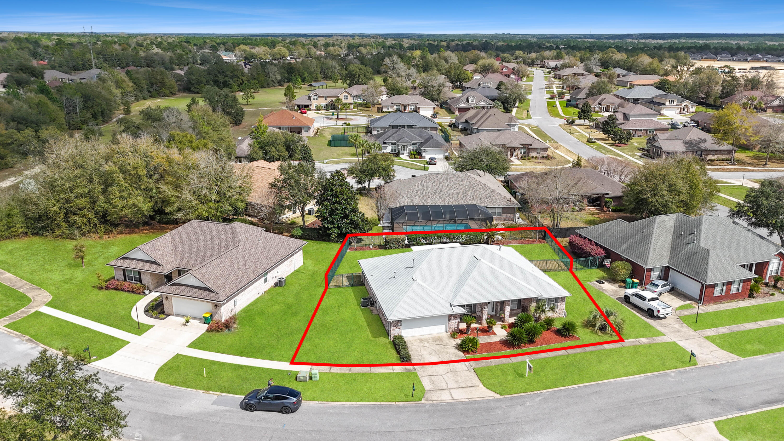 2903 Chancery Lane Crestview, FL 32539 - Photo 38 of 43 an aerial view of multiple houses with a yard