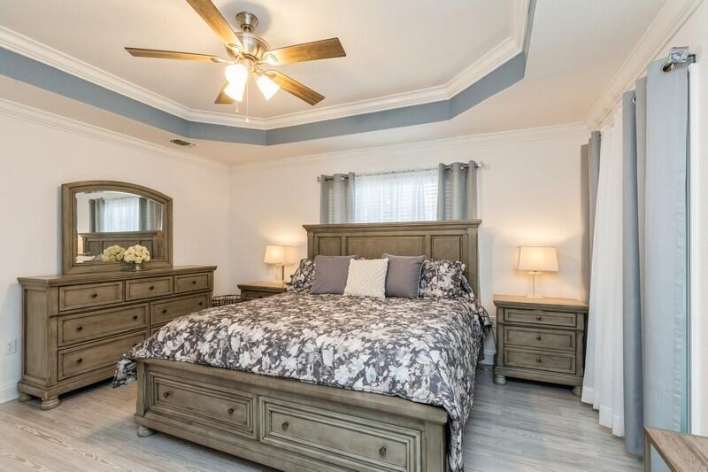 2903 Chancery Lane Crestview, FL 32539 - Photo 5 of 43 a bedroom with a bed and a dresser