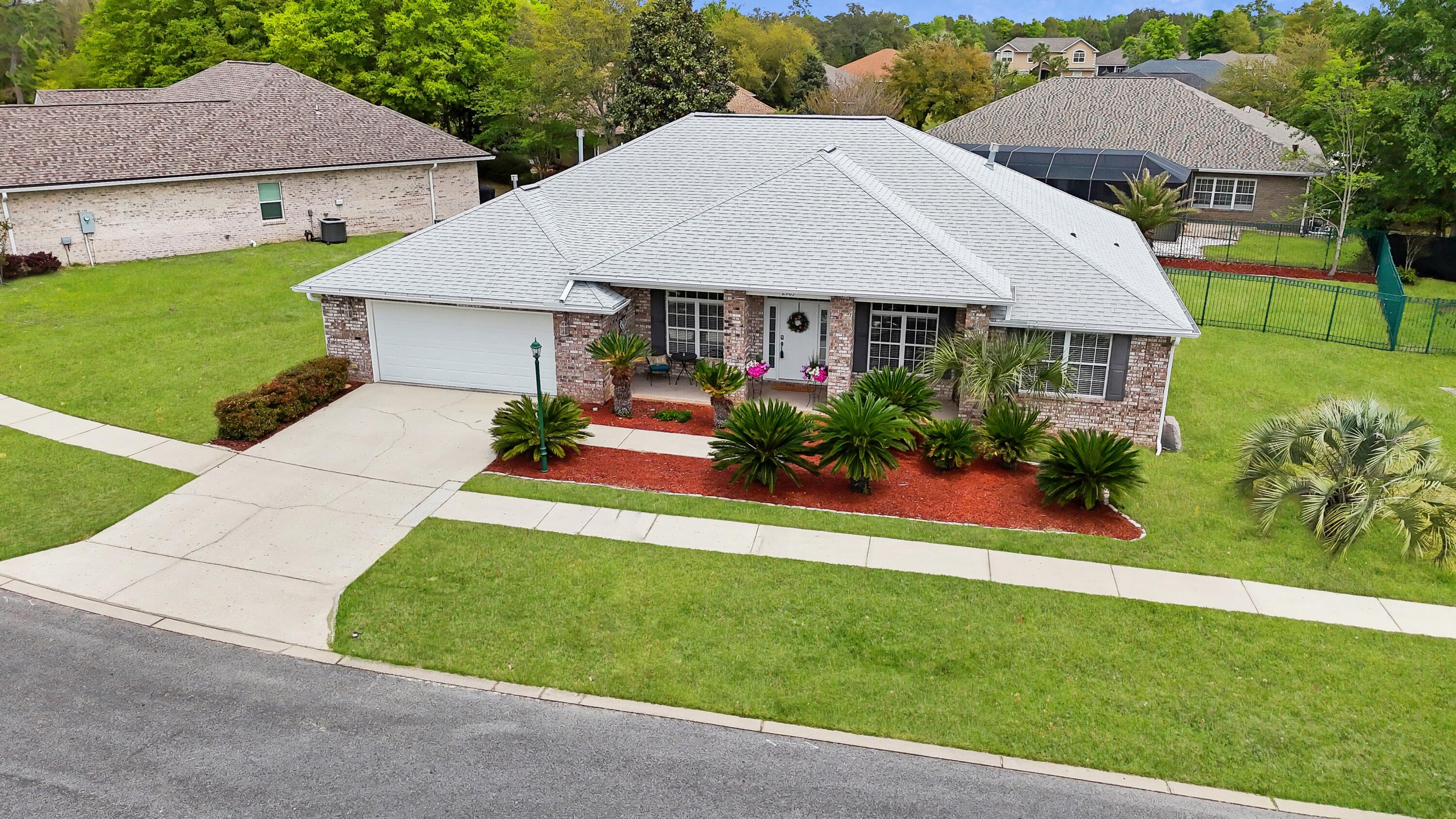 2903 Chancery Lane Crestview, FL 32539 - Photo 10 of 43 a aerial view of a house next to a yard