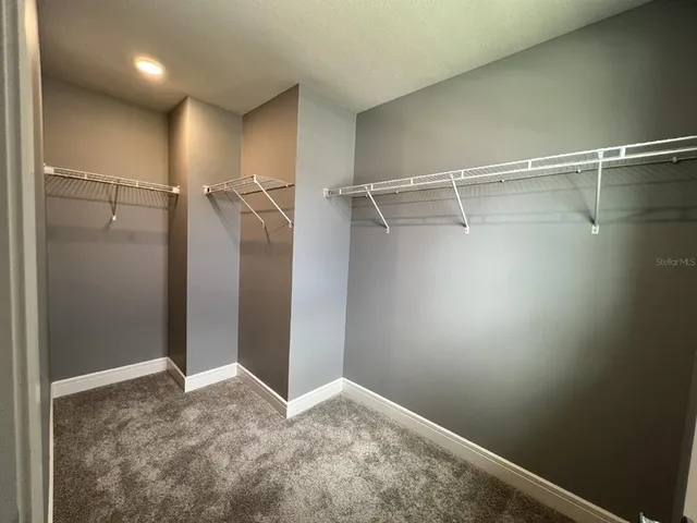 a view of a room with an empty space