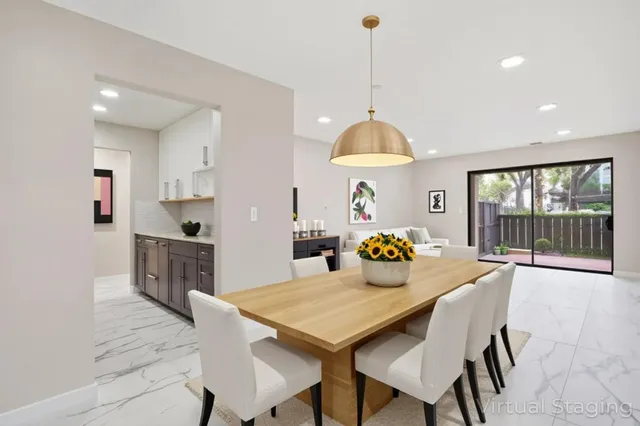 a view of a kitchen with a sink and cabinets