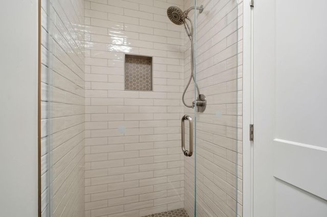 a view of outdoor space with wooden floor and windows