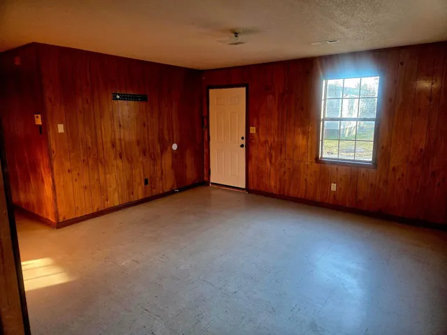 an empty room with windows