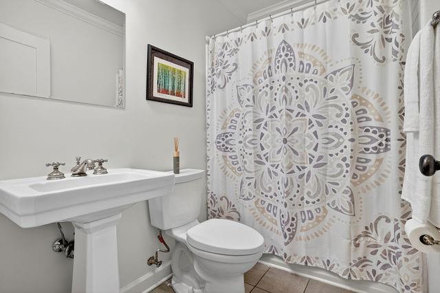 123 Mimosa Place Decatur, GA 30030 - Photo 11 of 48 a bathroom with a sink toilet and a mirror