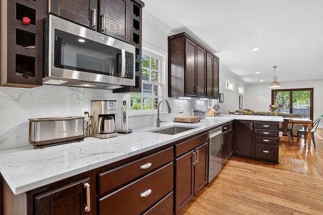 123 Mimosa Place Decatur, GA 30030 - Photo 14 of 48 a kitchen with stainless steel appliances granite countertop a sink and a microwave