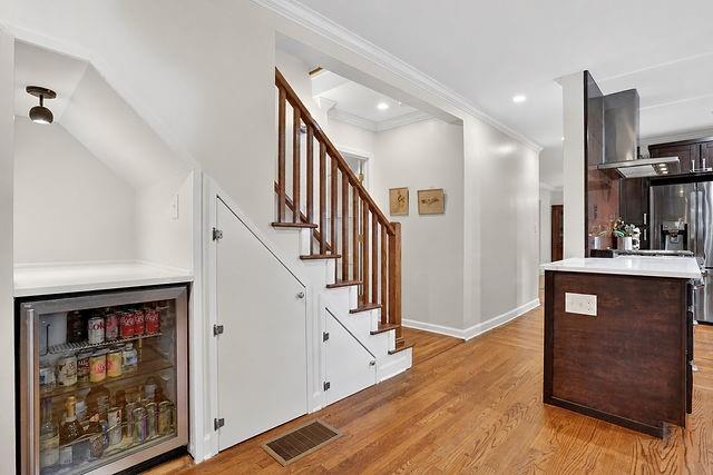 123 Mimosa Place Decatur, GA 30030 - Photo 25 of 48 a view of a hallway with wooden floor and staircase