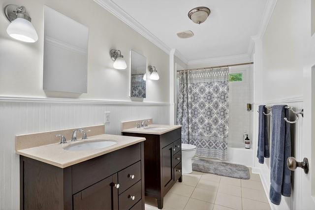 123 Mimosa Place Decatur, GA 30030 - Photo 29 of 48 a bathroom with a sink and a mirror
