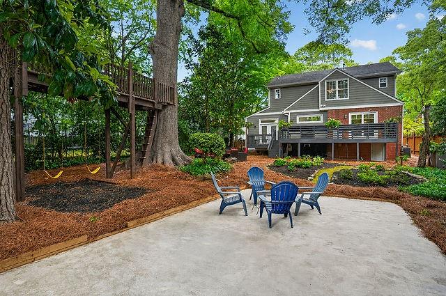 123 Mimosa Place Decatur, GA 30030 - Photo 38 of 48 a view of a house with a yard and sitting area