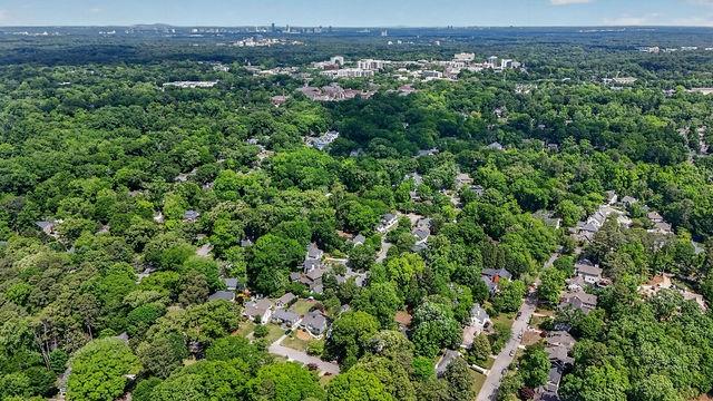 123 Mimosa Place Decatur, GA 30030 - Photo 45 of 48 an aerial view of a houses with a lush green hillside