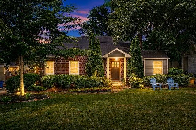123 Mimosa Place Decatur, GA 30030 - Photo 47 of 48 a front view of a house with a yard