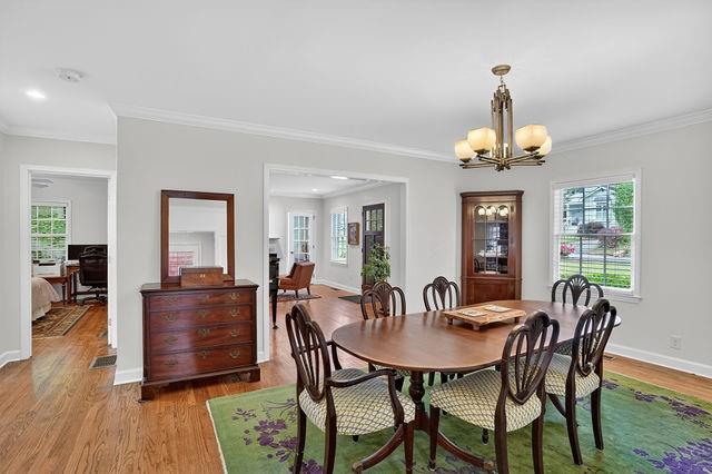 123 Mimosa Place Decatur, GA 30030 - Photo 7 of 48 a view of a dining room with furniture and wooden floor