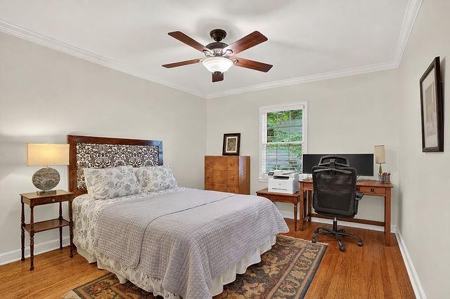 123 Mimosa Place Decatur, GA 30030 - Photo 9 of 48 a bedroom with a bed and wooden floor
