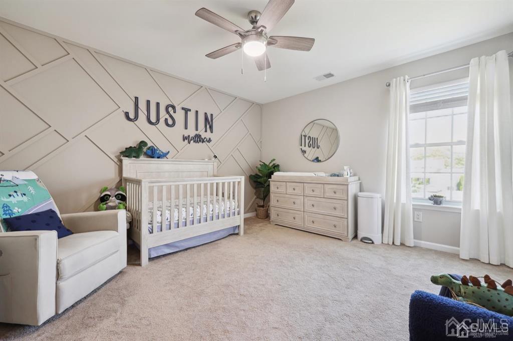 20 Strachan Street Cliffwood, NJ 07721 - Photo 13 of 21 a bedroom with furniture and a large window