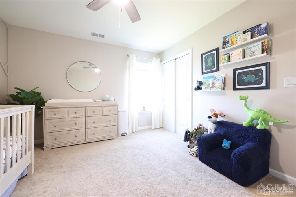20 Strachan Street Cliffwood, NJ 07721 - Photo 14 of 21 a living room with furniture and a flat screen tv