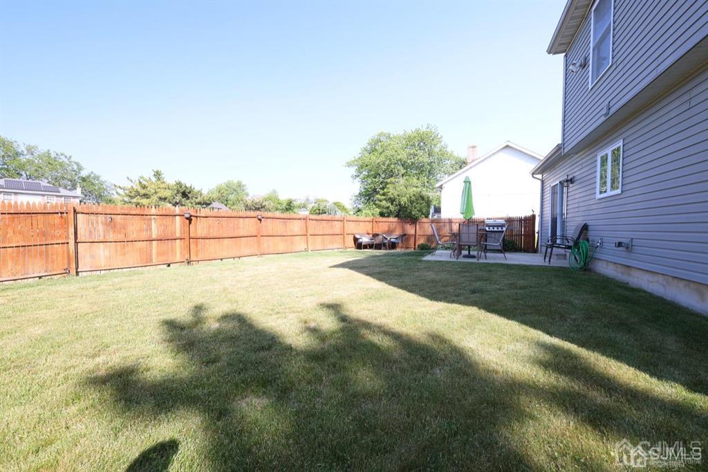 20 Strachan Street Cliffwood, NJ 07721 - Photo 21 of 21 a view of yard with outdoor seating