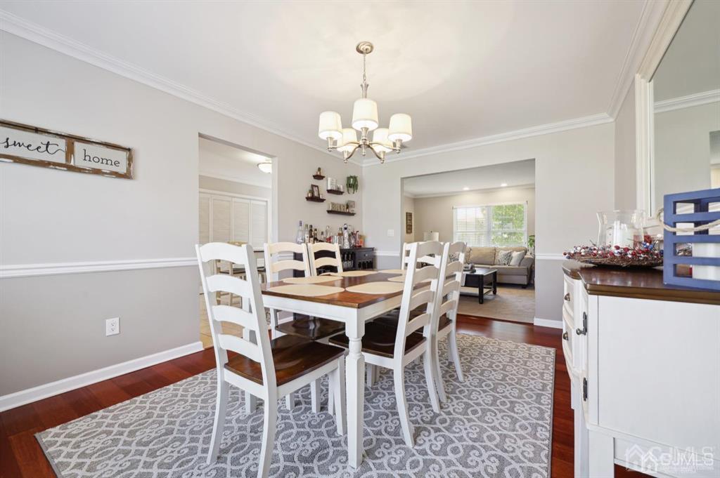 20 Strachan Street Cliffwood, NJ 07721 - Photo 4 of 21 a view of a dining room with furniture and chandelier
