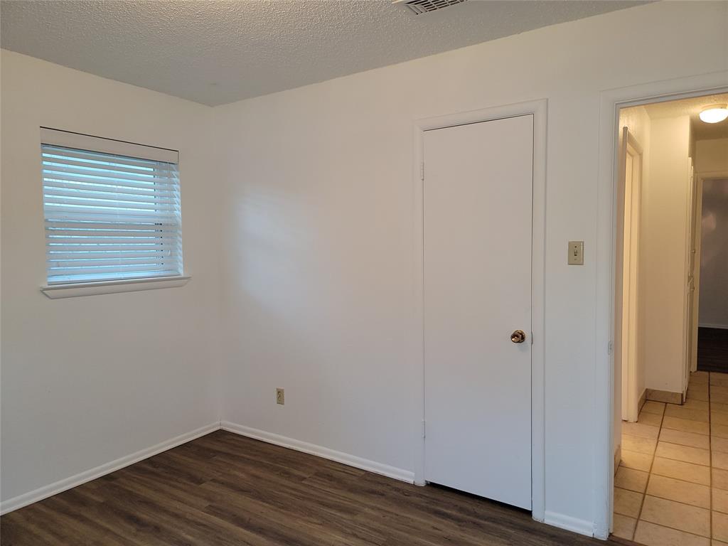 1000 Springdale Road Bedford, TX 76021 - Photo 26 of 36 Bedroom 3 walk-in closet.
