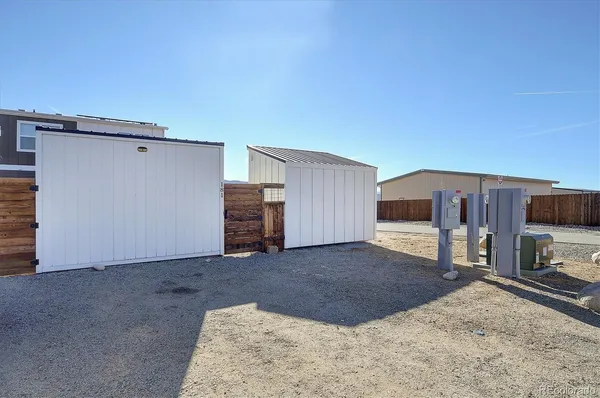 a view of a kitchen with a sink