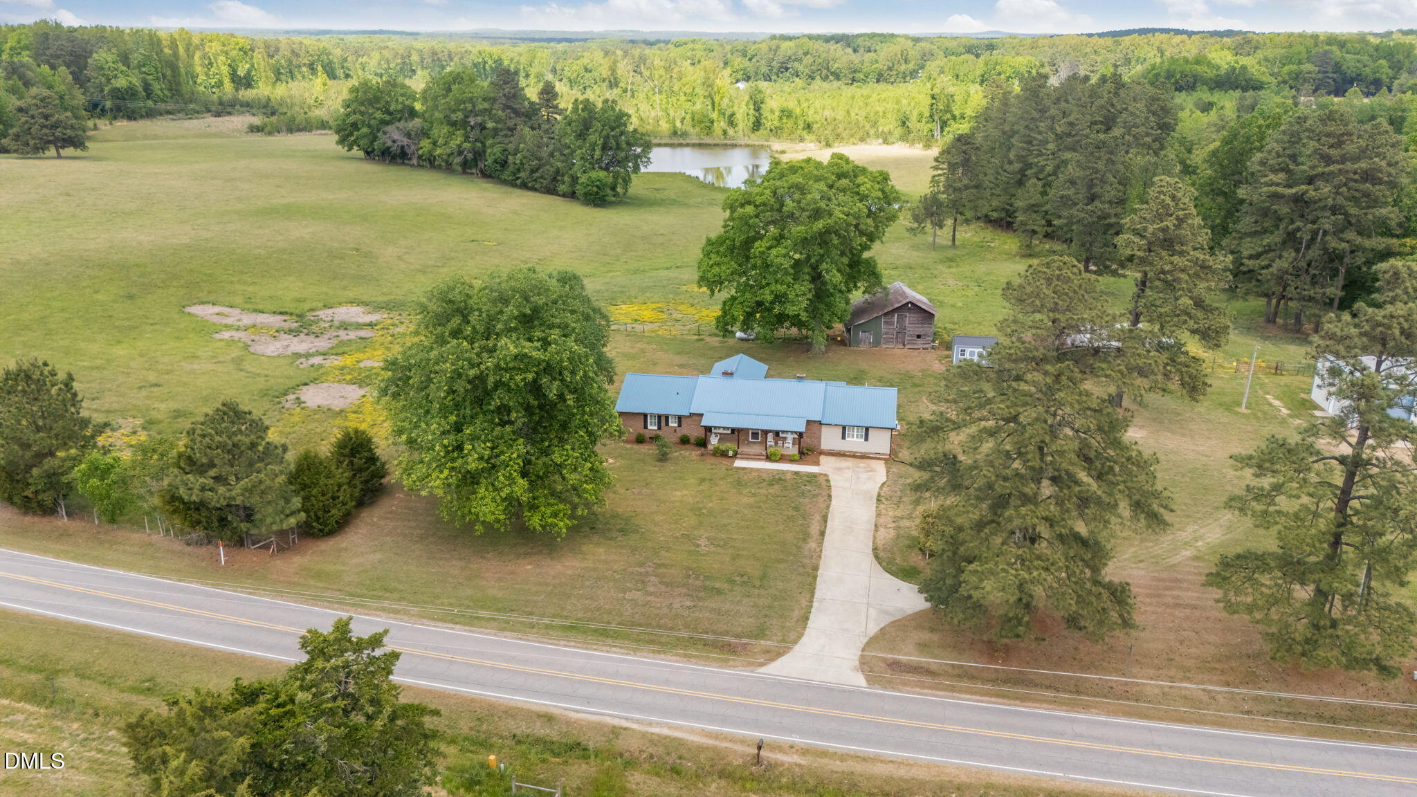 3611 Chewning Road Oxford, NC 27565 - Photo 26 of 45 a view of a lake from a yard
