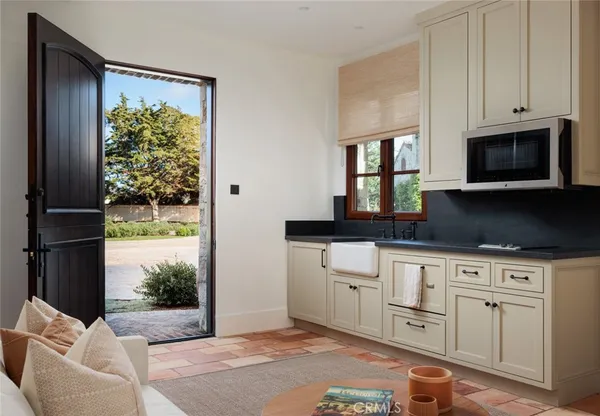a view of a street with a table and chairs
