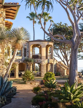 a front view of a building with garden