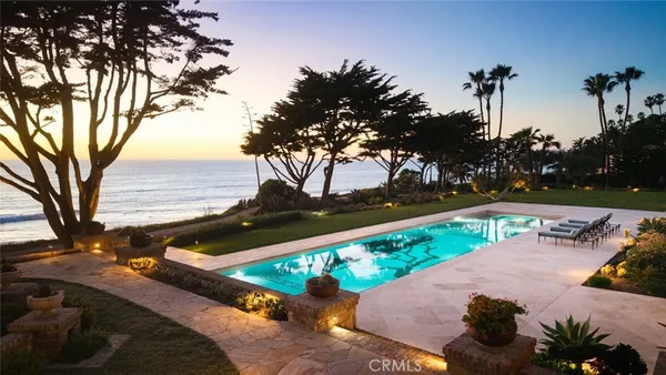 a view of a lake with a yard