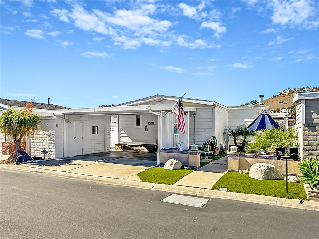 26 Mira Las Olas San Clemente, CA 92673 - Photo 1 of 34 a view of a house with a patio