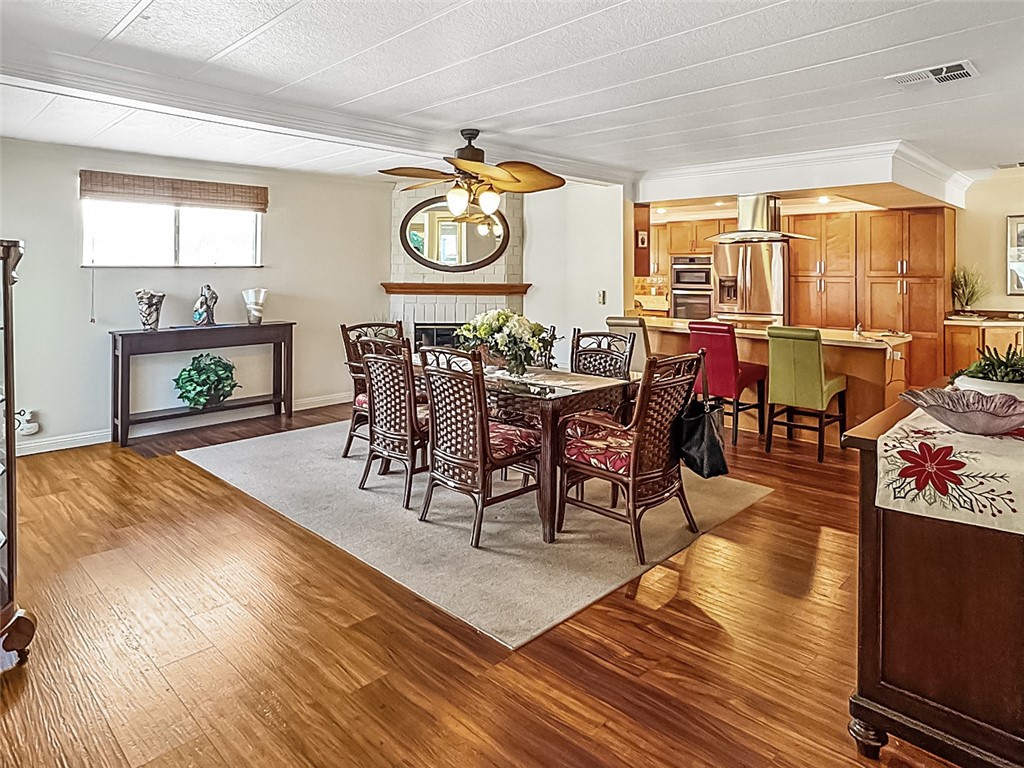 26 Mira Las Olas San Clemente, CA 92673 - Photo 13 of 34 a view of a dining room with furniture and a window