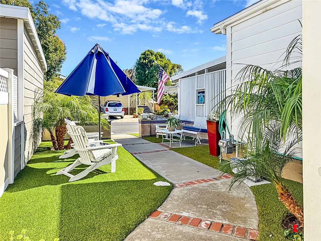 26 Mira Las Olas San Clemente, CA 92673 - Photo 20 of 34 a view of yard with swimming pool and furniture