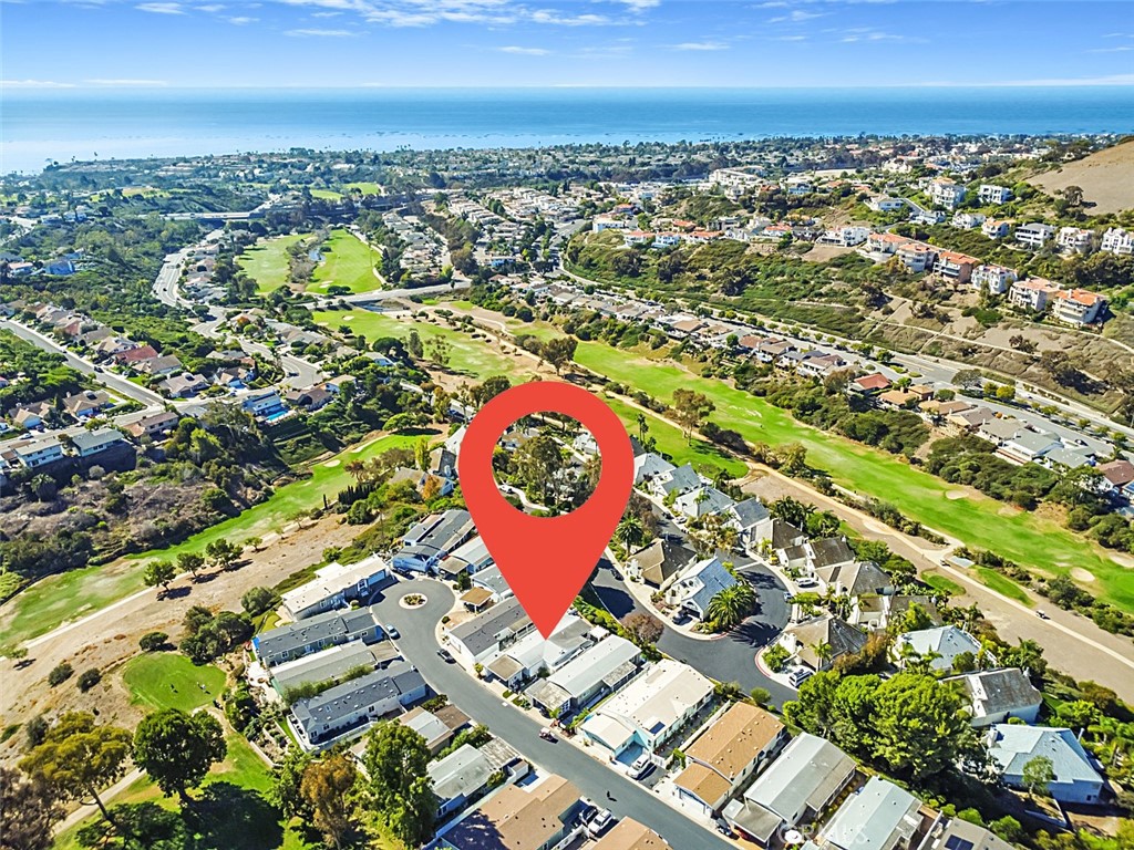 26 Mira Las Olas San Clemente, CA 92673 - Photo 23 of 34 an aerial view of residential building and parking space