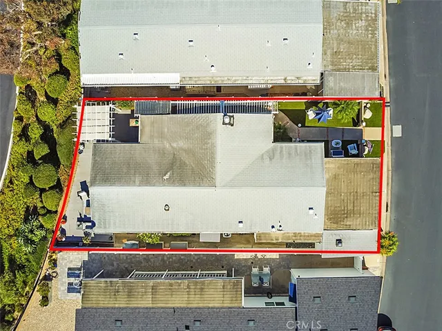 a view of a swimming pool with outdoor seating