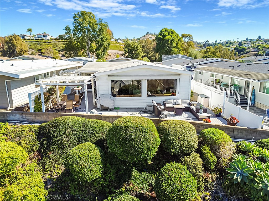 26 Mira Las Olas San Clemente, CA 92673 - Photo 31 of 34 a view of a swimming pool with outdoor seating