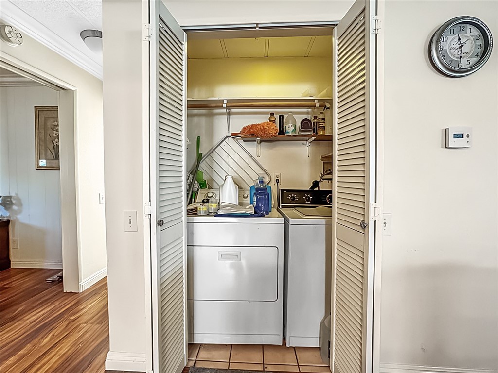 26 Mira Las Olas San Clemente, CA 92673 - Photo 10 of 34 a view of a hallway with wooden floor
