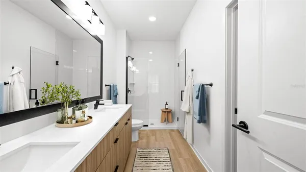 a kitchen with a sink and refrigerator