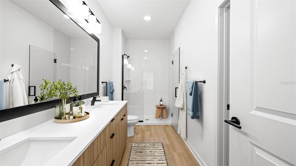 2285 Crown Vlg Road, Unit A1 Ocoee, FL 34761 - Photo 18 of 21 a kitchen with a sink and refrigerator