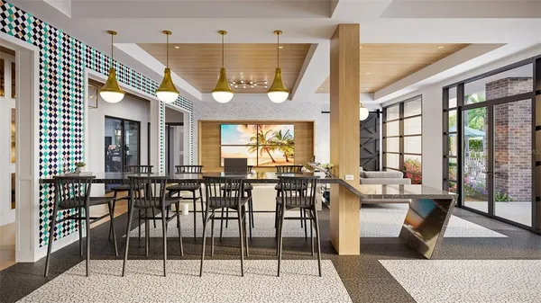 a view of a dining room with furniture window and outside view