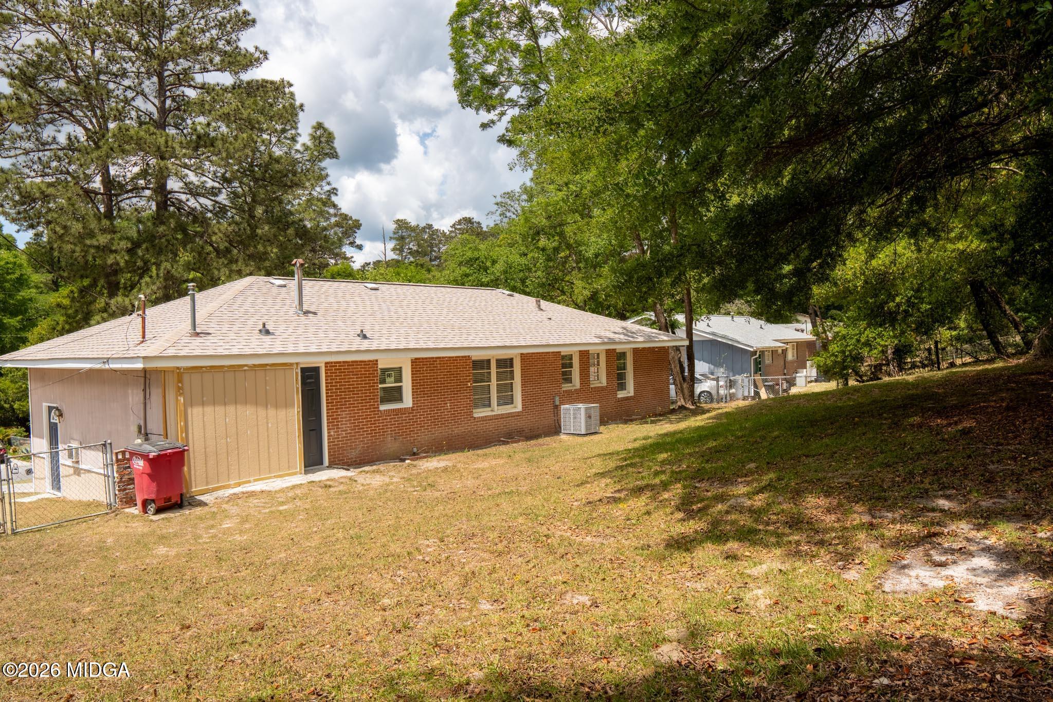 3319 Mohawk Road Macon, GA 31217 - Photo 8 of 38 a view of a house with a yard