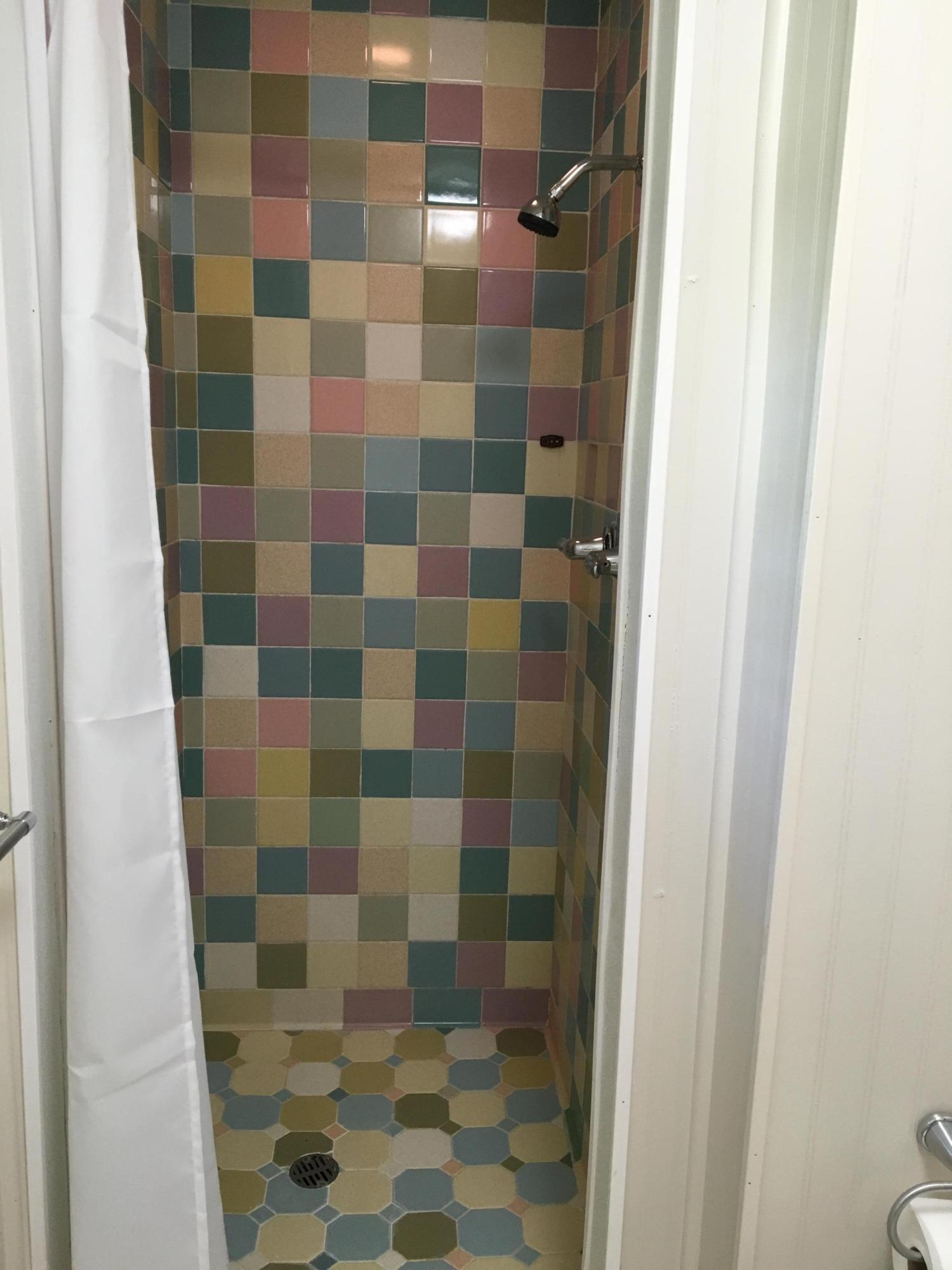 2461 Bay Grove Road Freeport, FL 32439 - Photo 22 of 44 a bathroom with a shower