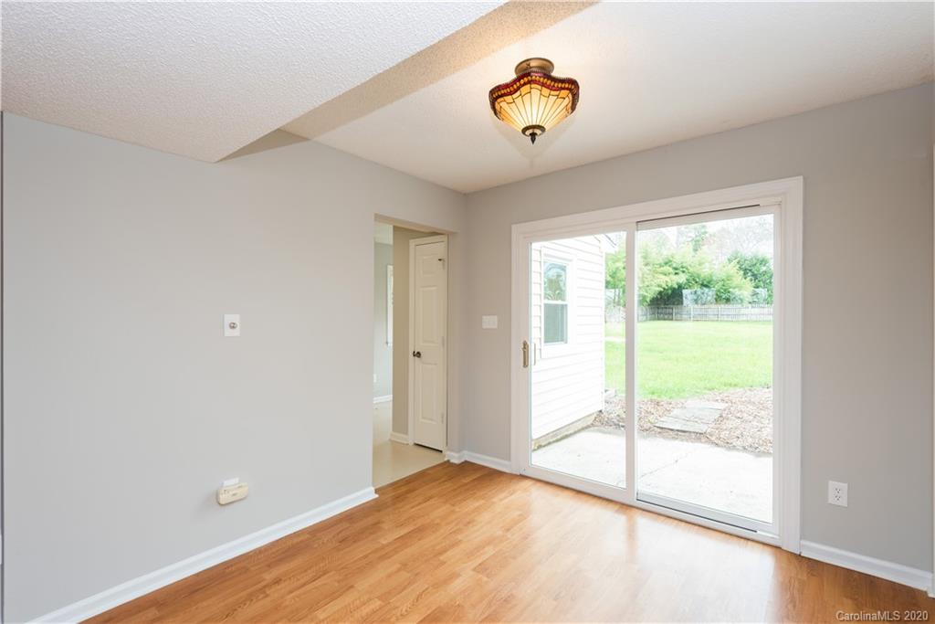 10602 Fairway Ridge Road Charlotte, NC 28277 - Photo 11 of 32 a view of an empty room and window