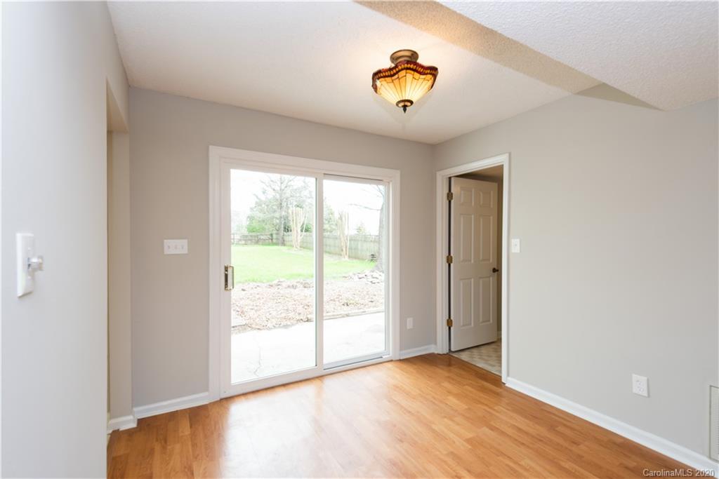10602 Fairway Ridge Road Charlotte, NC 28277 - Photo 12 of 32 a view of an empty room and window