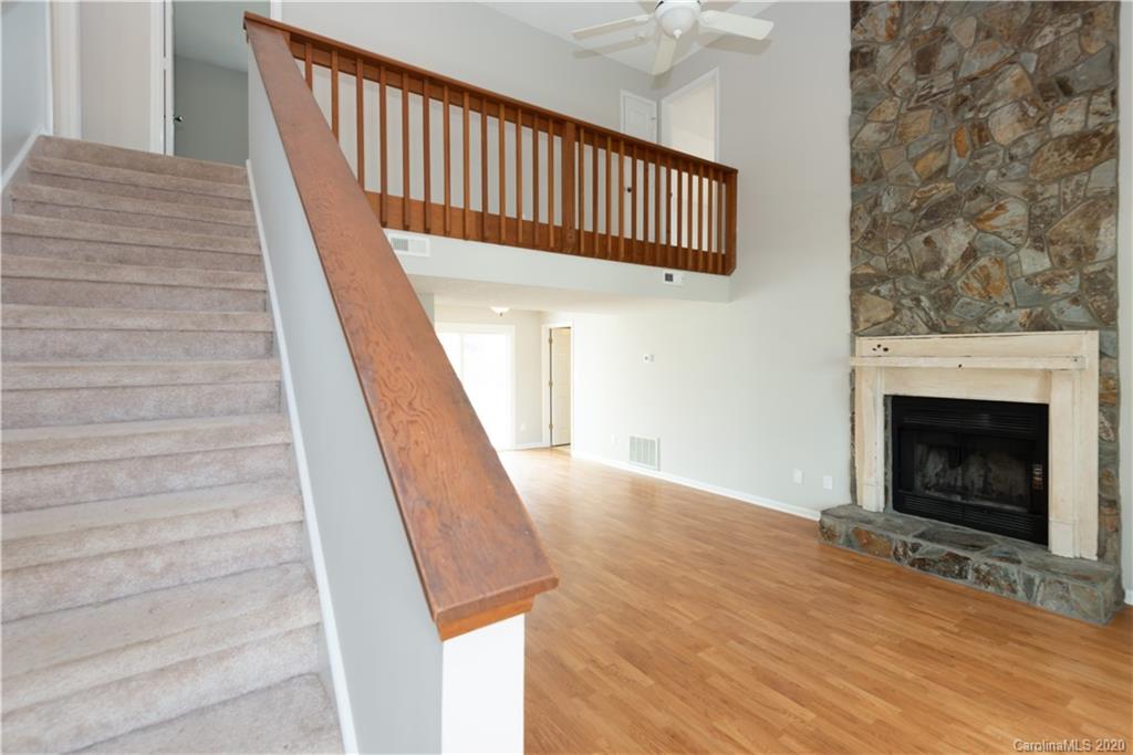 10602 Fairway Ridge Road Charlotte, NC 28277 - Photo 3 of 32 a view of entryway and hall with wooden floor