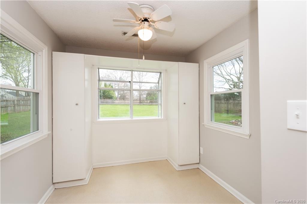 10602 Fairway Ridge Road Charlotte, NC 28277 - Photo 10 of 32 a view of an empty room with a window