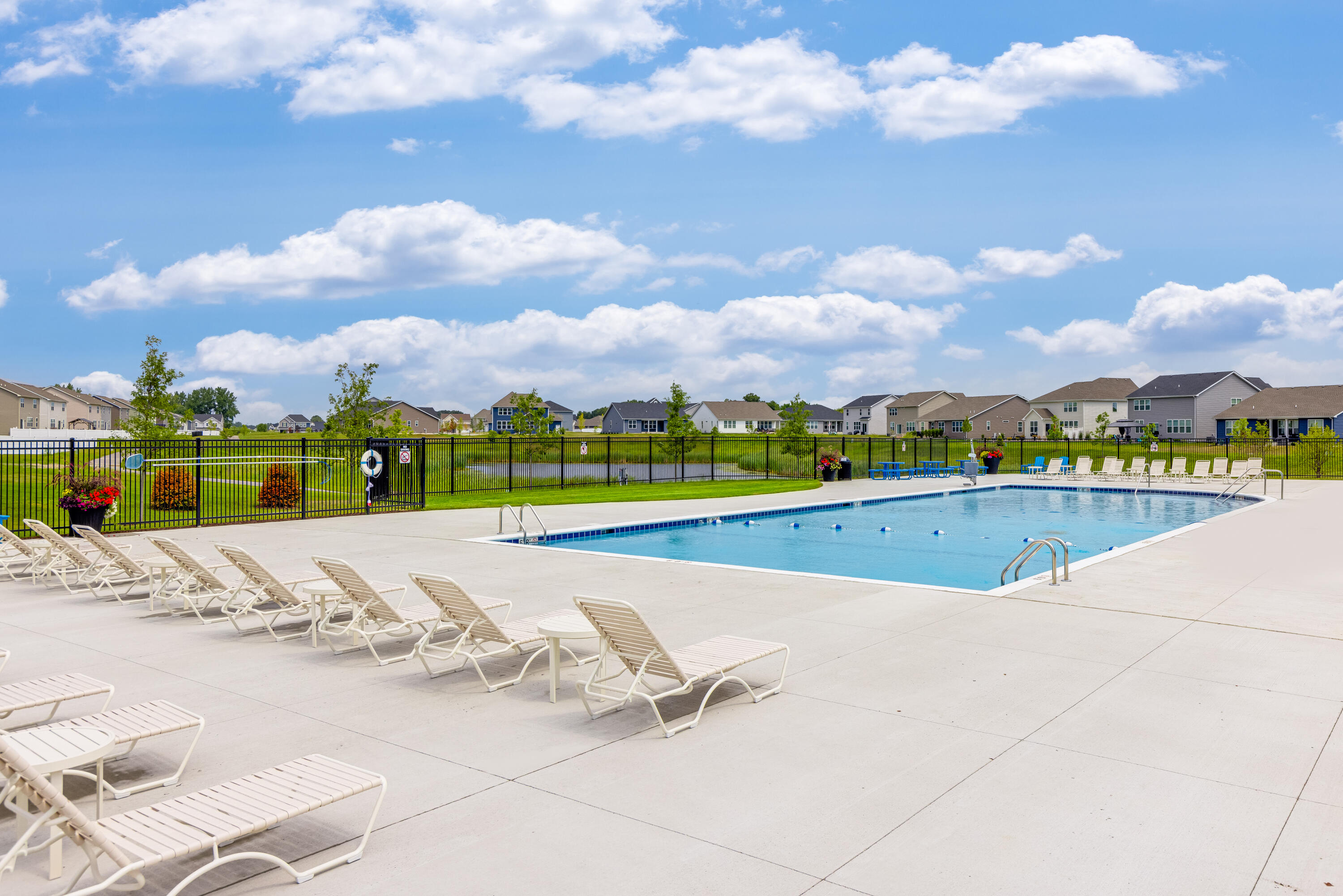 11034 Green Place Winfield, IN 46307 - Photo 27 of 42 a view of swimming pool with outdoor seating and city view