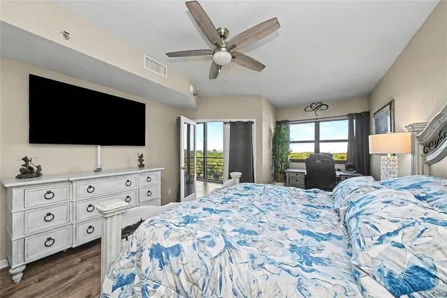 a bathroom with a shower a toilet and a sink