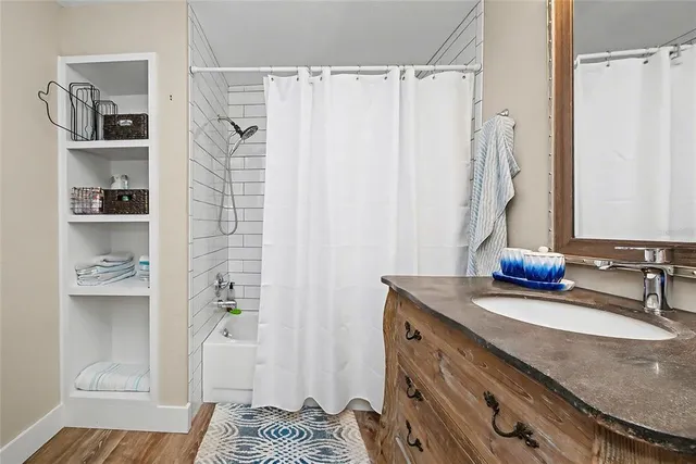 a room with furniture and a potted plant