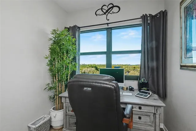 a kitchen with stainless steel appliances granite countertop a refrigerator a sink and a stove