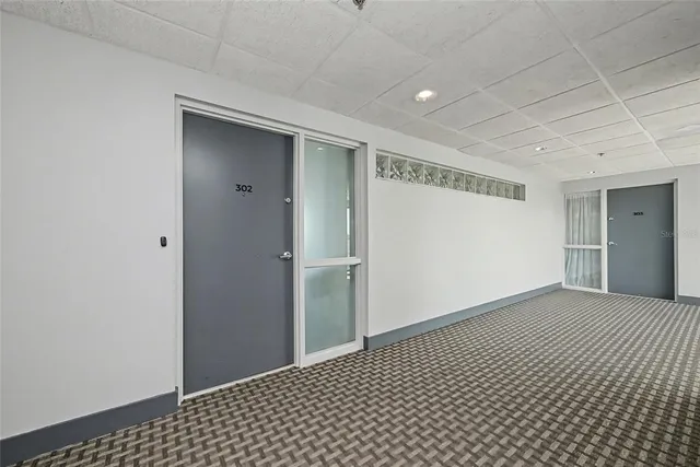 a view of a building with a yard