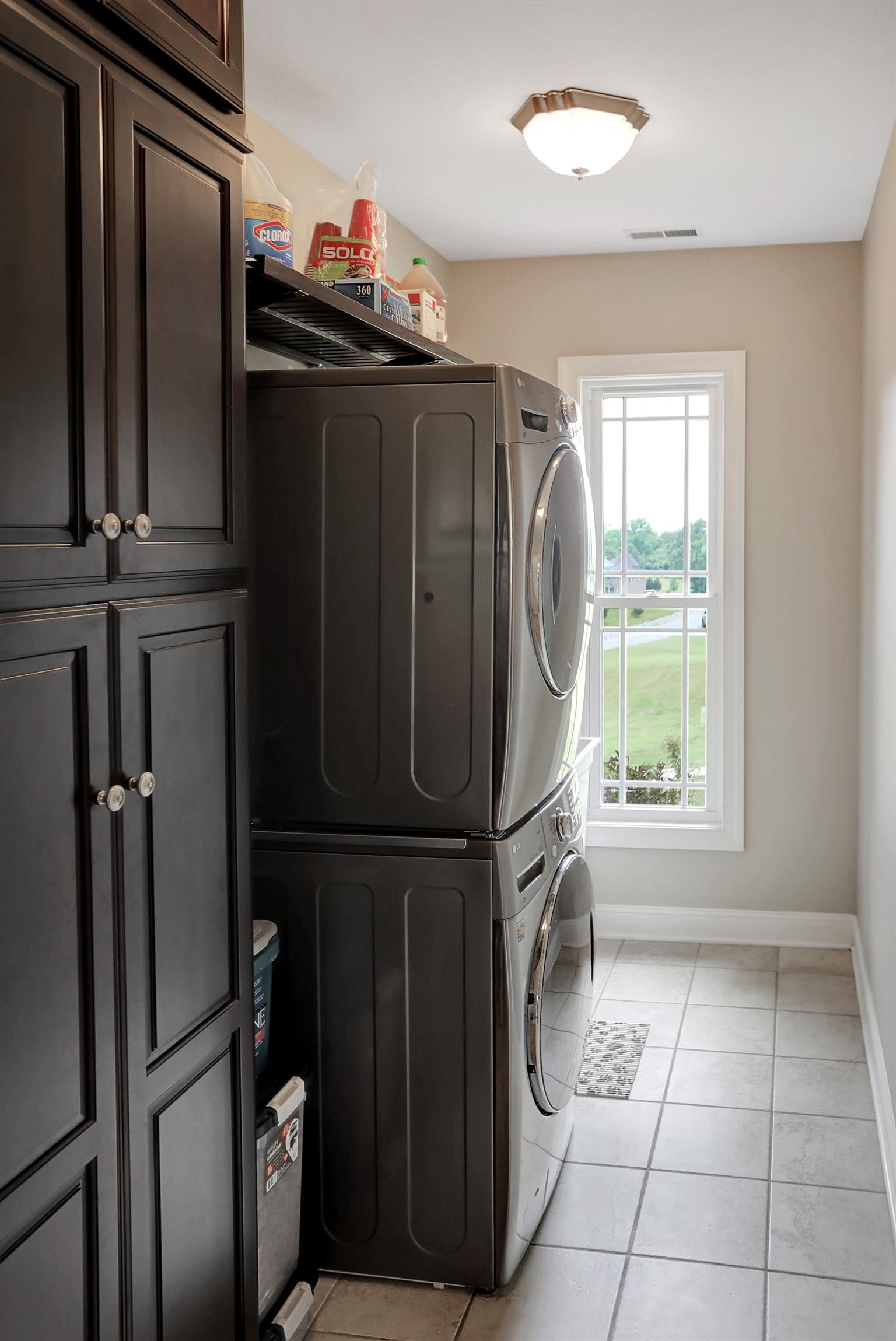 2377 Pleasant View Road Pleasant View, TN 37146 - Photo 21 of 30 Laundry room has ample storage and extra pantry storage, laundry tub