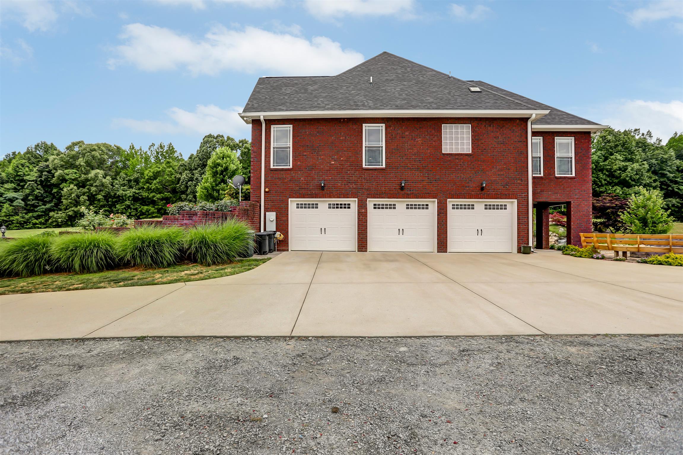 2377 Pleasant View Road Pleasant View, TN 37146 - Photo 4 of 30 Large 3 car garage can house a full size truck- approx 850 sq ft