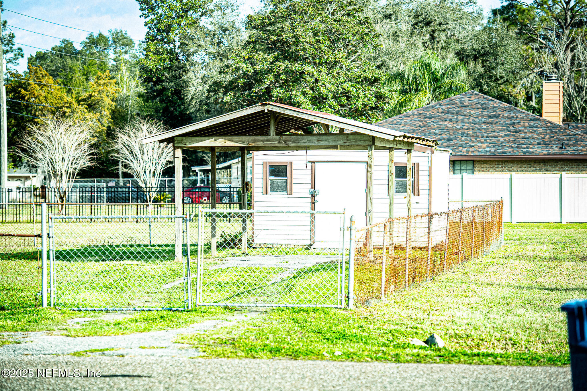 13203 Dunn Creek Road Jacksonville, FL 32218 - Photo 6 of 14 Detached Covered Carport